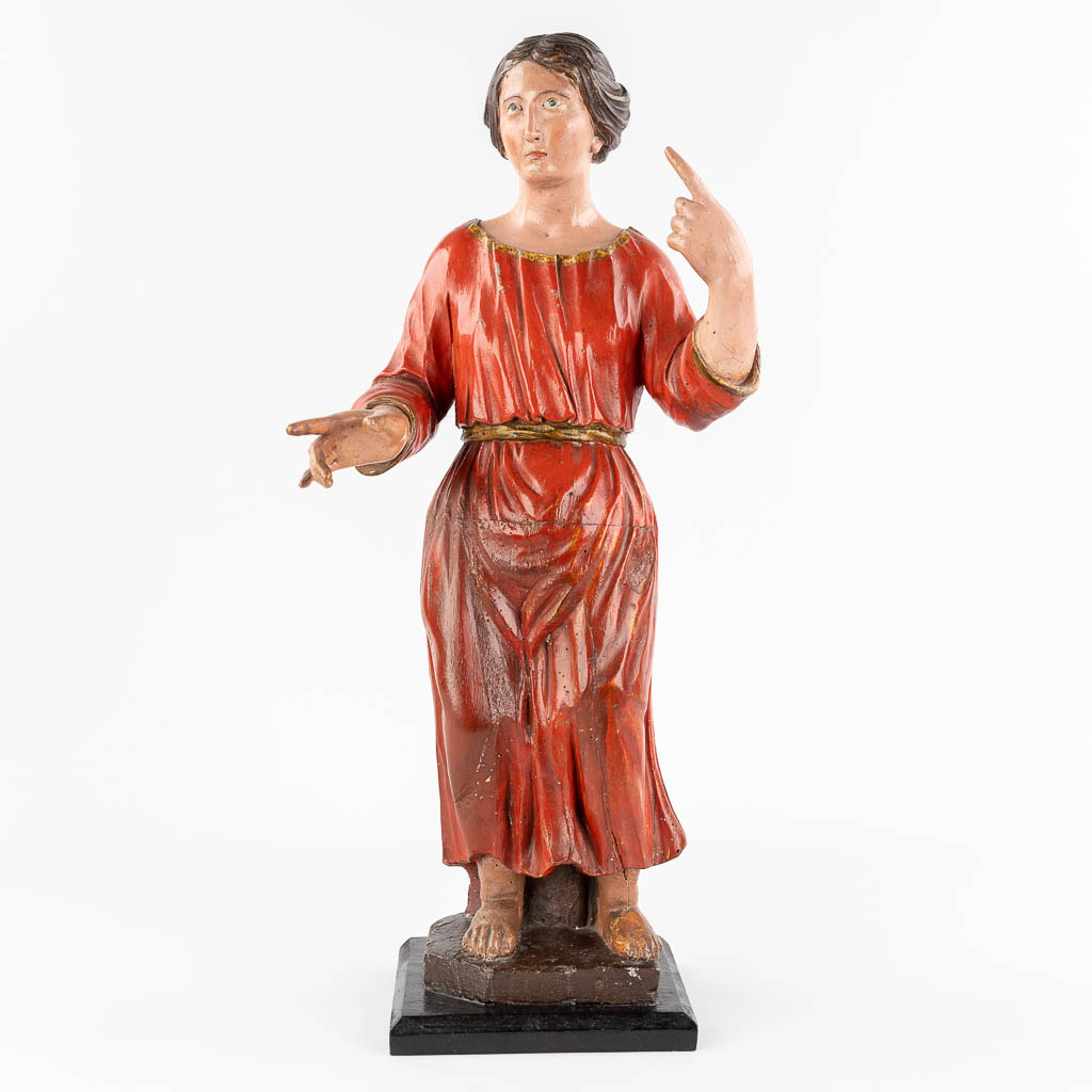 An antique wood-sculptured and polychrome figurine of a noble lady. 18th/19th C. (L: 20 x W: 25 x H: 60 cm)