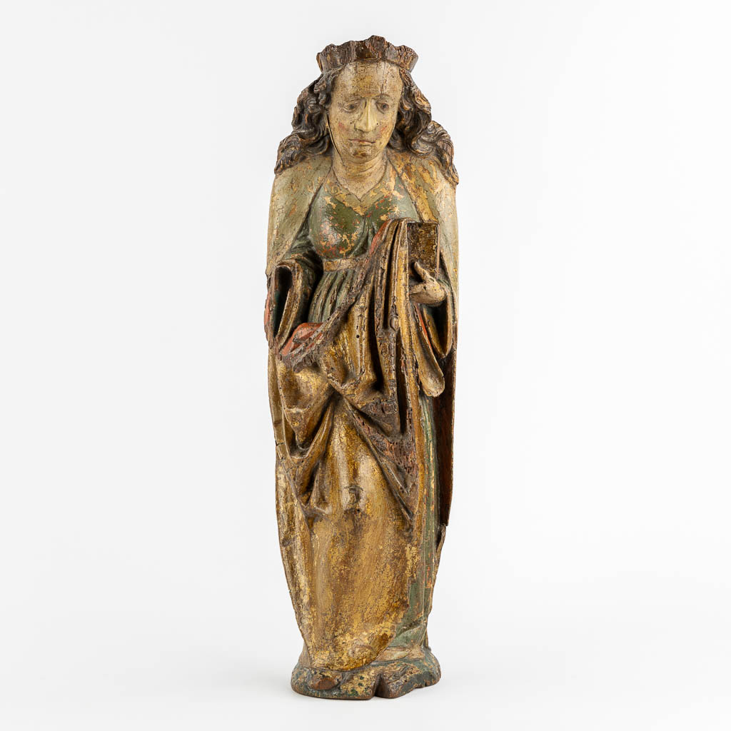 Saint Ursula, princess of Bretagne, a wood sculpture, Rhineland, Late 14th C. (L:13 x W:17 x H:58 cm)