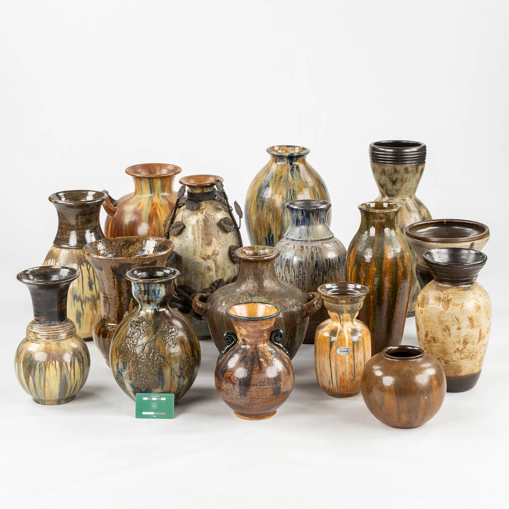 Sixteen vases and jugs, Guérin, Dubois, Losson, Bouffioulx. (H:47 cm)