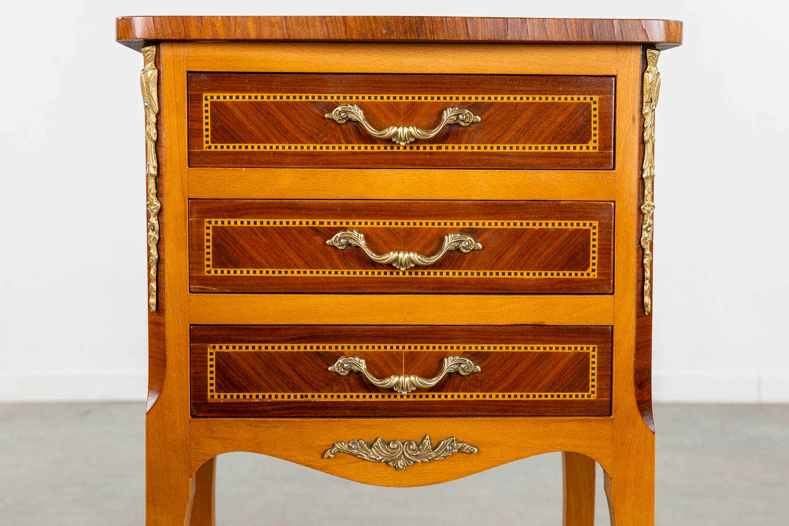 Three side tables, marquetry inlay. Two with a marble top. Circa 1980. (L:33 x W:42 x H:70 cm)