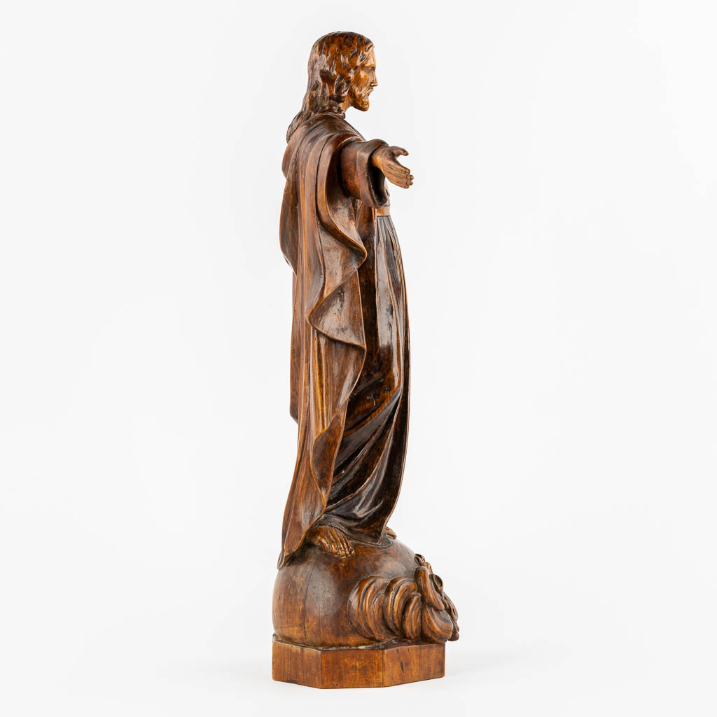 An antique wood sculpture of 'Jesus Christ The Redeemer'.