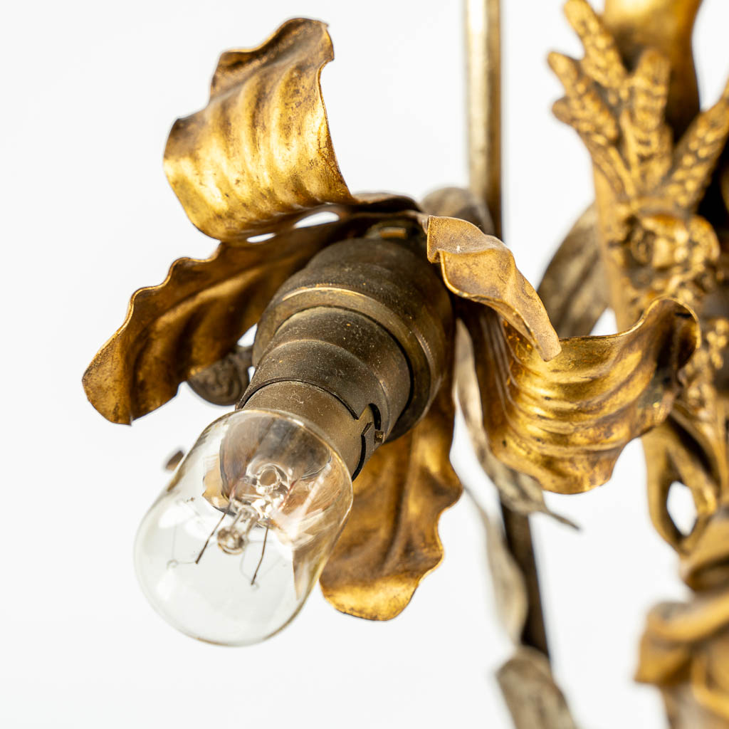 A table lamp with an Angel or Nimph, gilt spelter. (c.1900). 