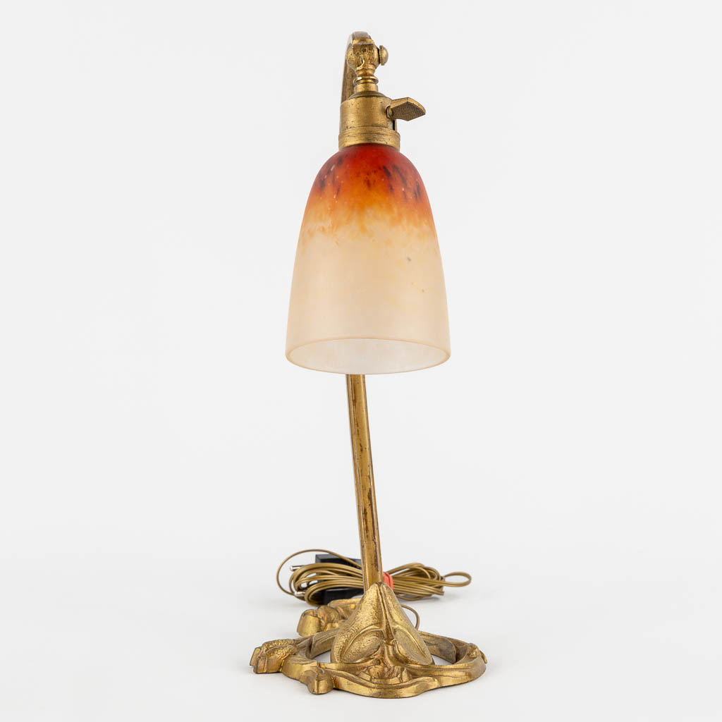 Schneider, an Art Nouveau period table lamp. (L:15 x W:25 x H:37 cm)