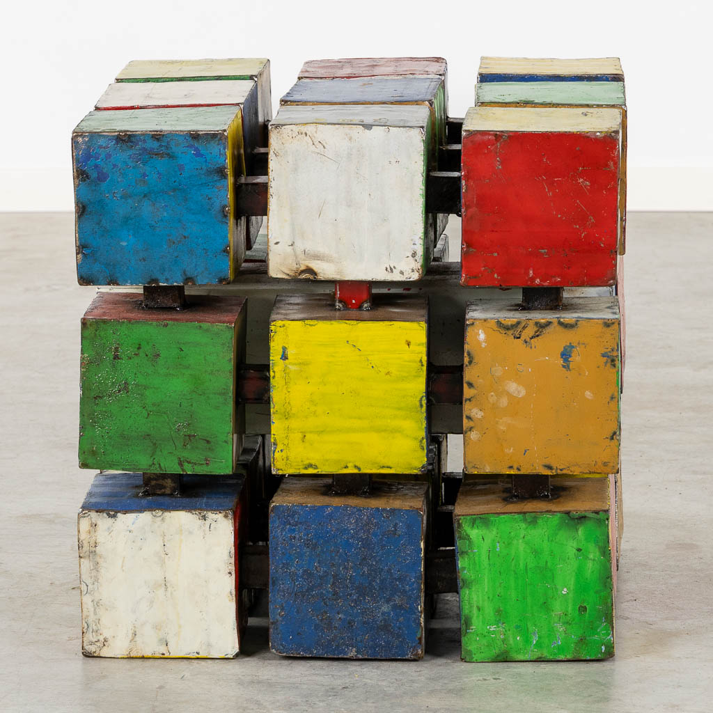 A mid-century side table in the shape of a Rubik's Cube 