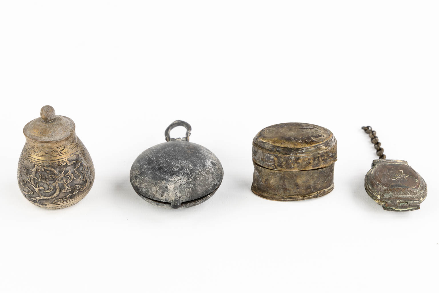 Fourteen Islamic and Indian Amulet or Trinklet boxes, Silver and silver-plate. 19th/20th C. (L:9,5 x W:16,5 x H:2,5 cm)