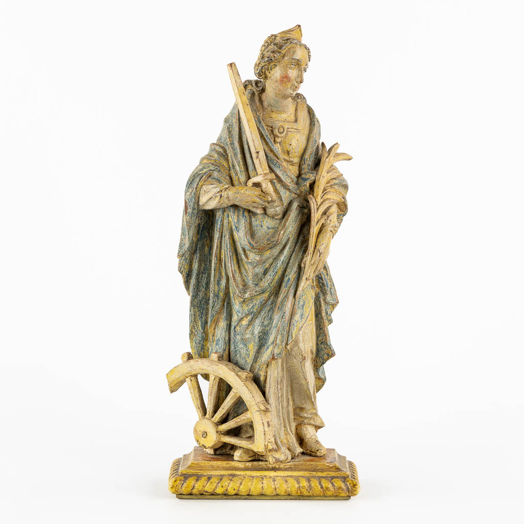 Saint Catherine, an antique wood sculpture, probably 18th C. (L:8 x W:13 x H:32 cm)