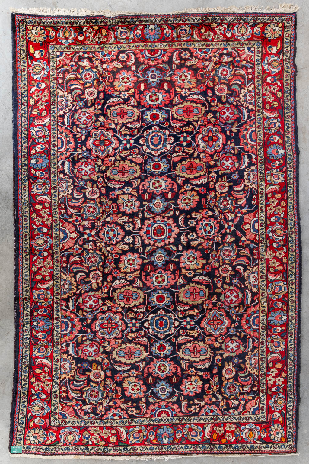 A hand-made carpet. (L:327 x W:222 cm)