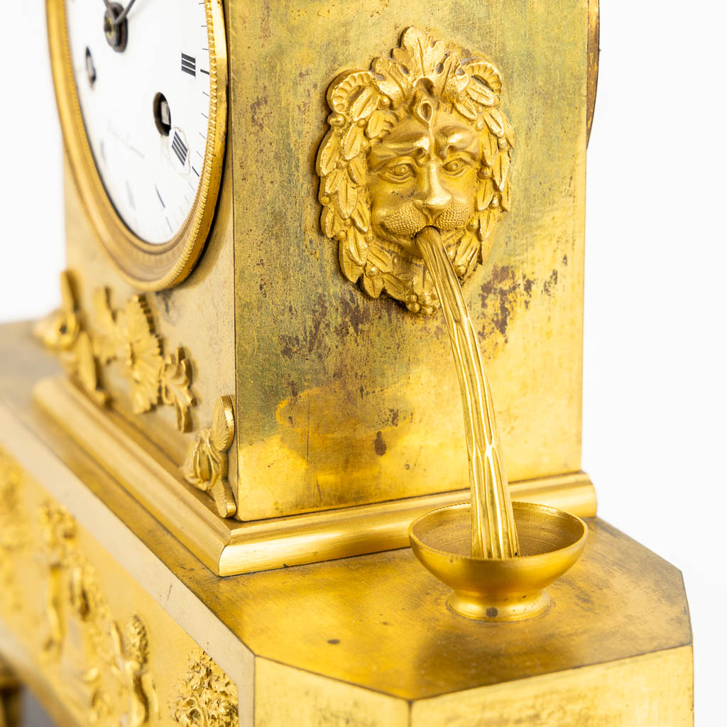 A mantle clock, Gilt bronze, Empire, 