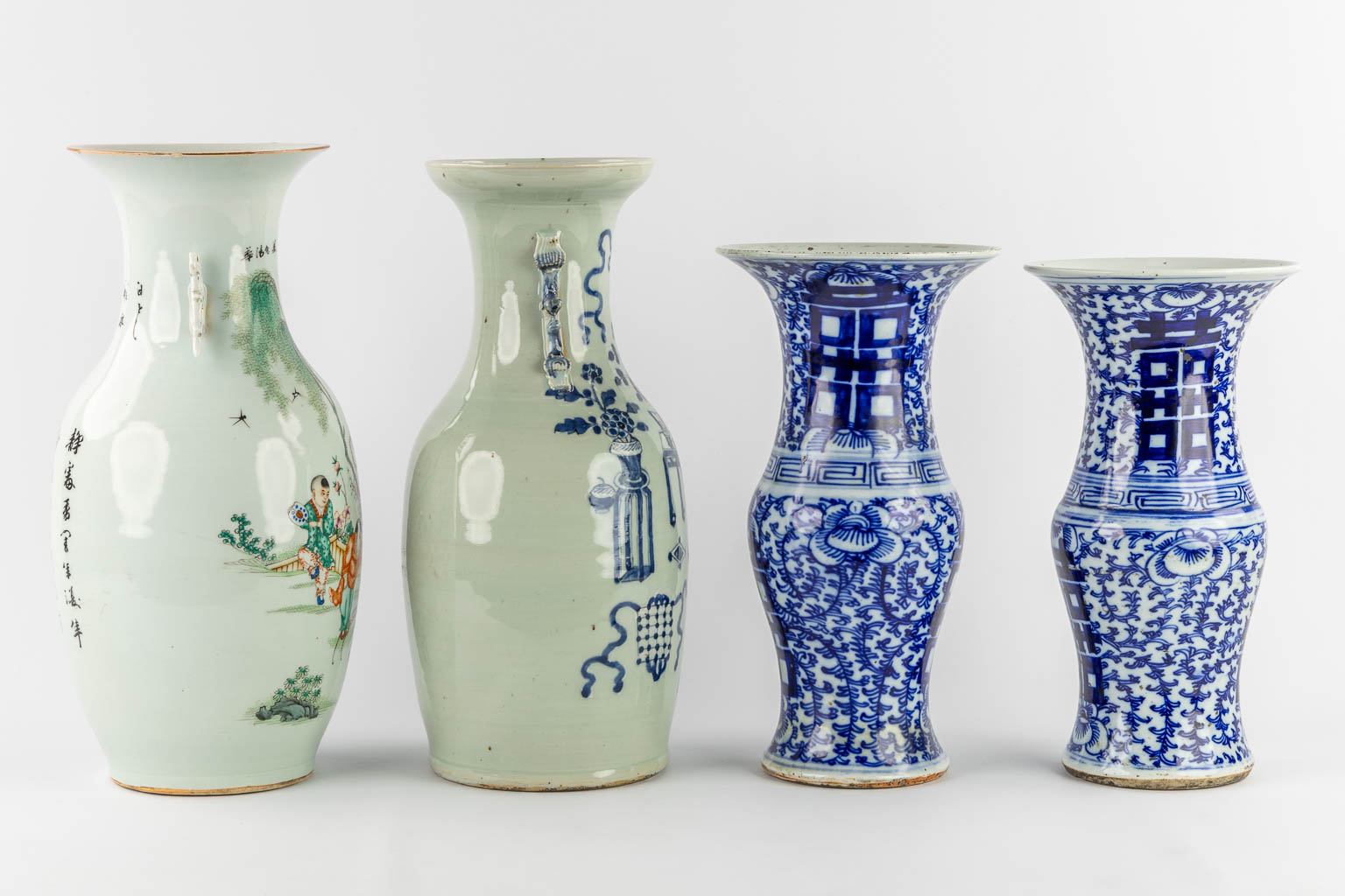 Four Chinese vases, blue white and polychrome. 