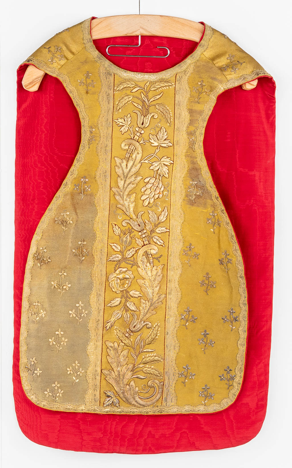 Three Roman Chasubles, Two stola, two pillows and a Humeral Veil. Thick gold thread embroideries.