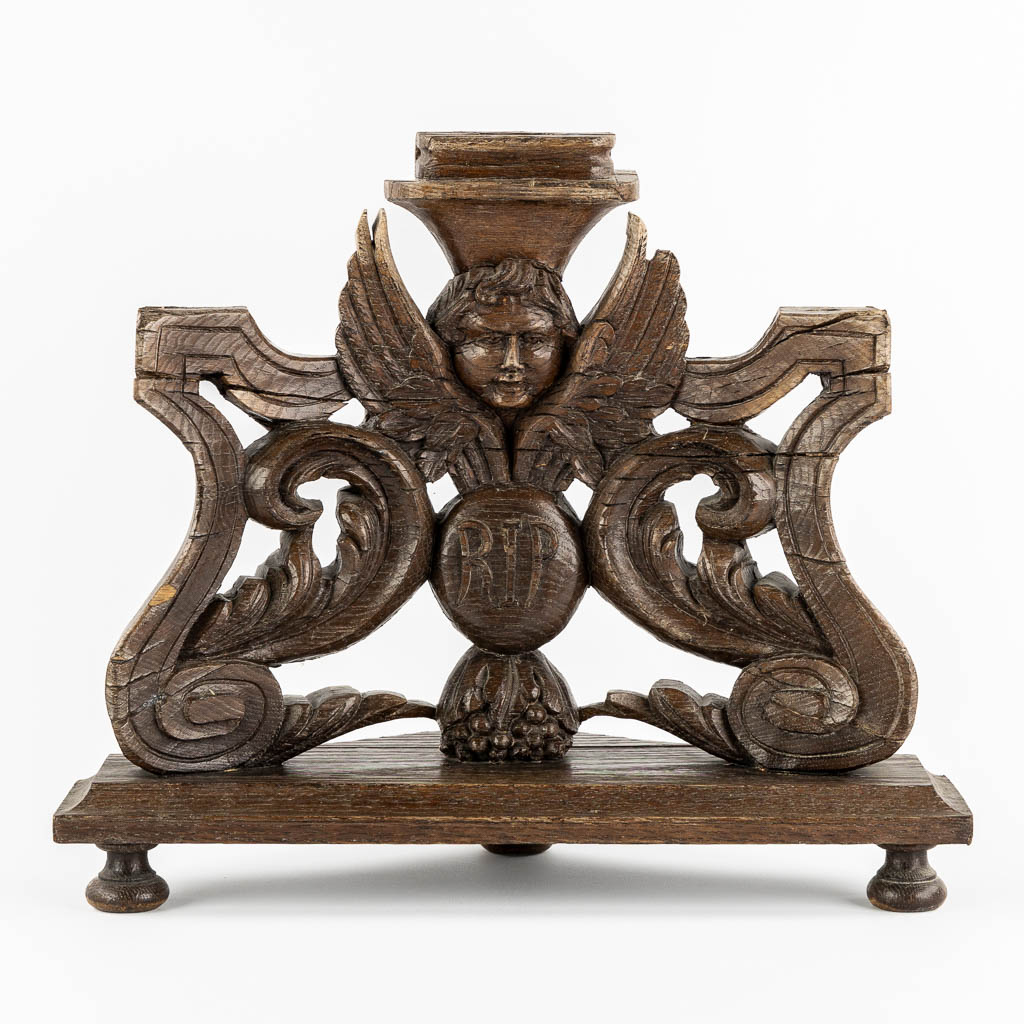 An antique wood-sculptured angel. 