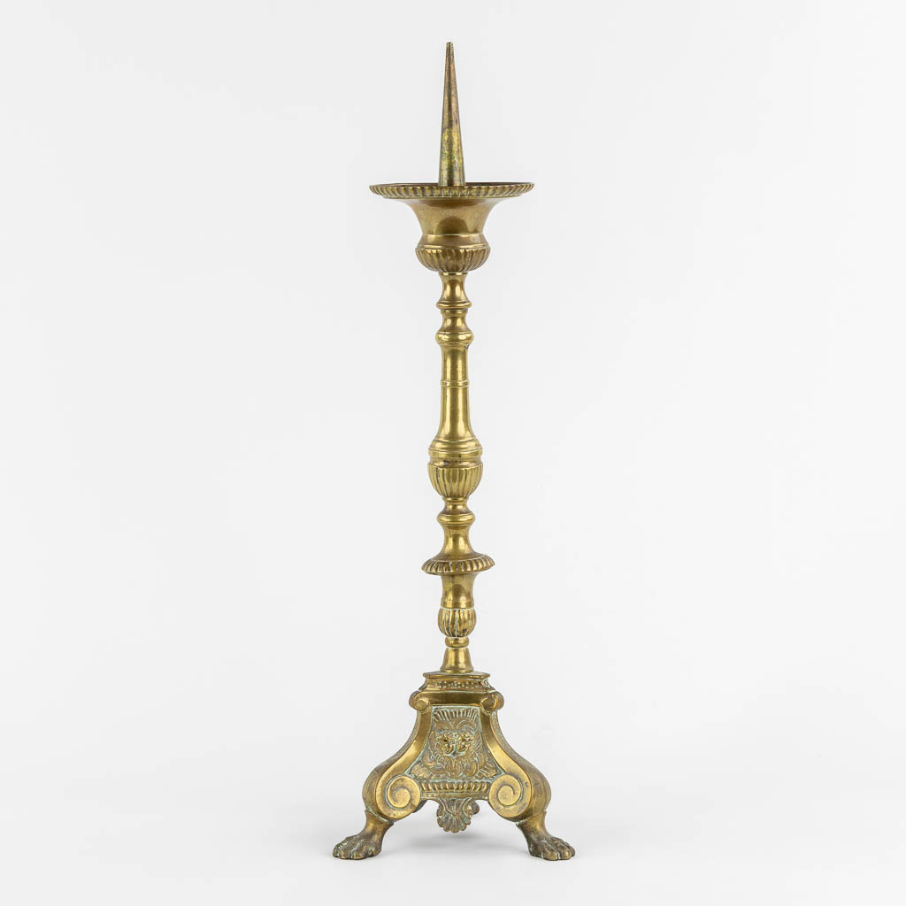 An antique candlestick, finished with putti, 18th C. (H:54 cm)