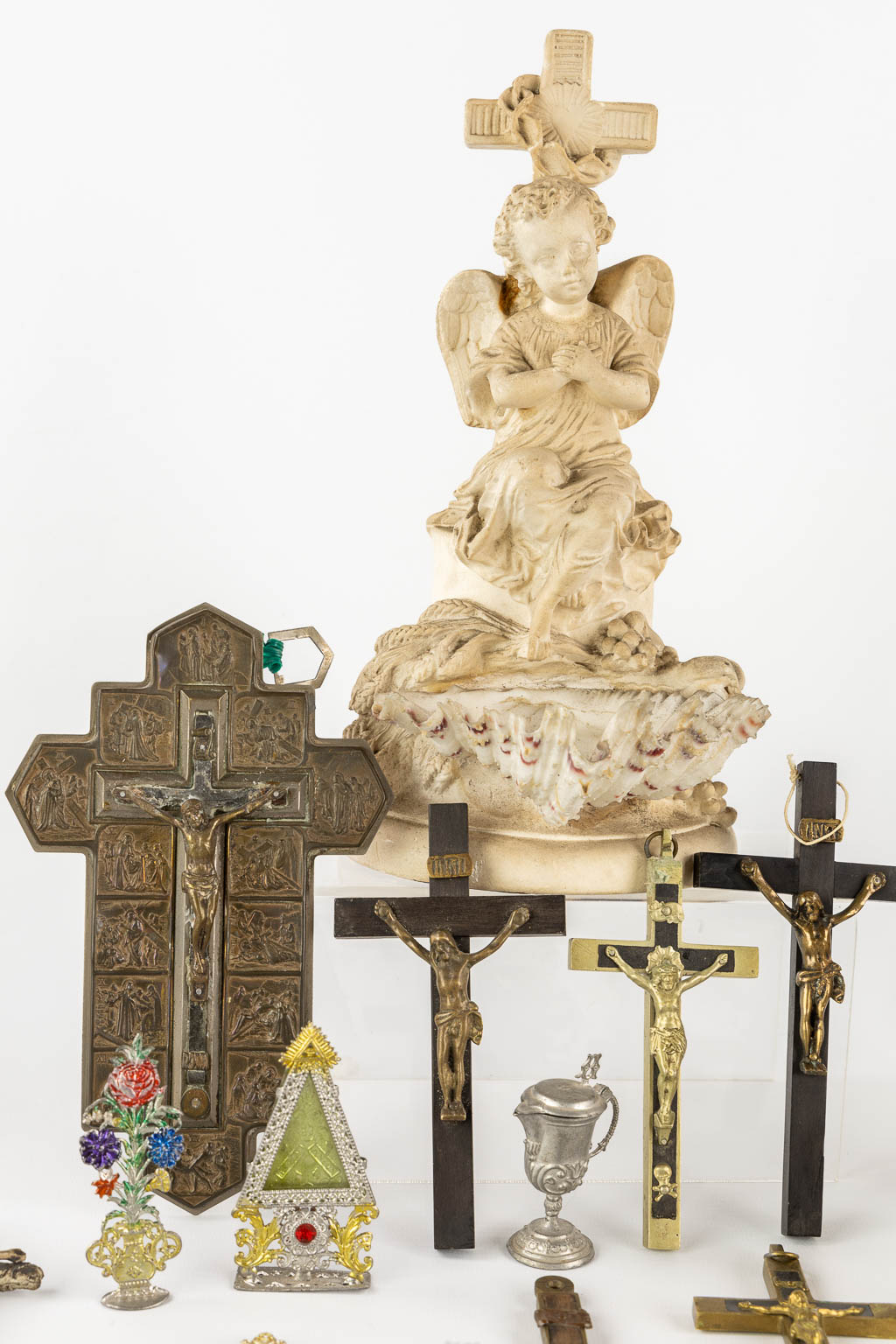 A large collection of Deovionalia, holy water fonts, monstrances and reliquaries. 