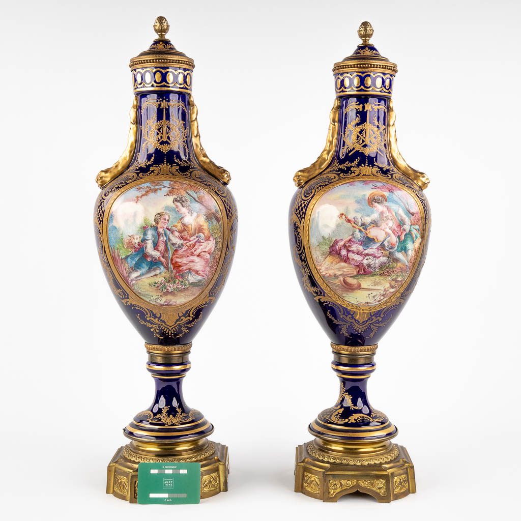 A pair of hand-painted and cobalt blue vases, J. Tiélès, Paris, France. (H:67 x D:20 cm)