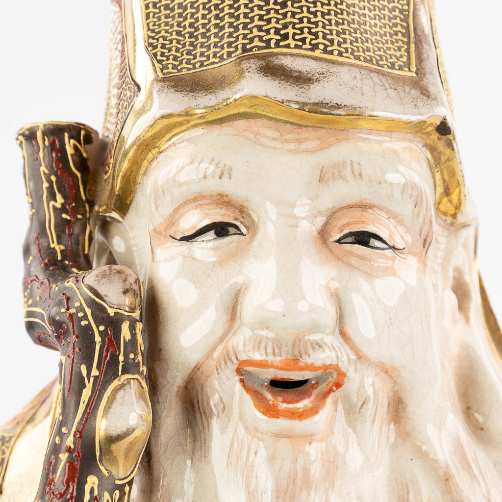 An Japanese figurine of a wise man, Satusma stoneware. (L:23 x W:29 x H:60 cm)