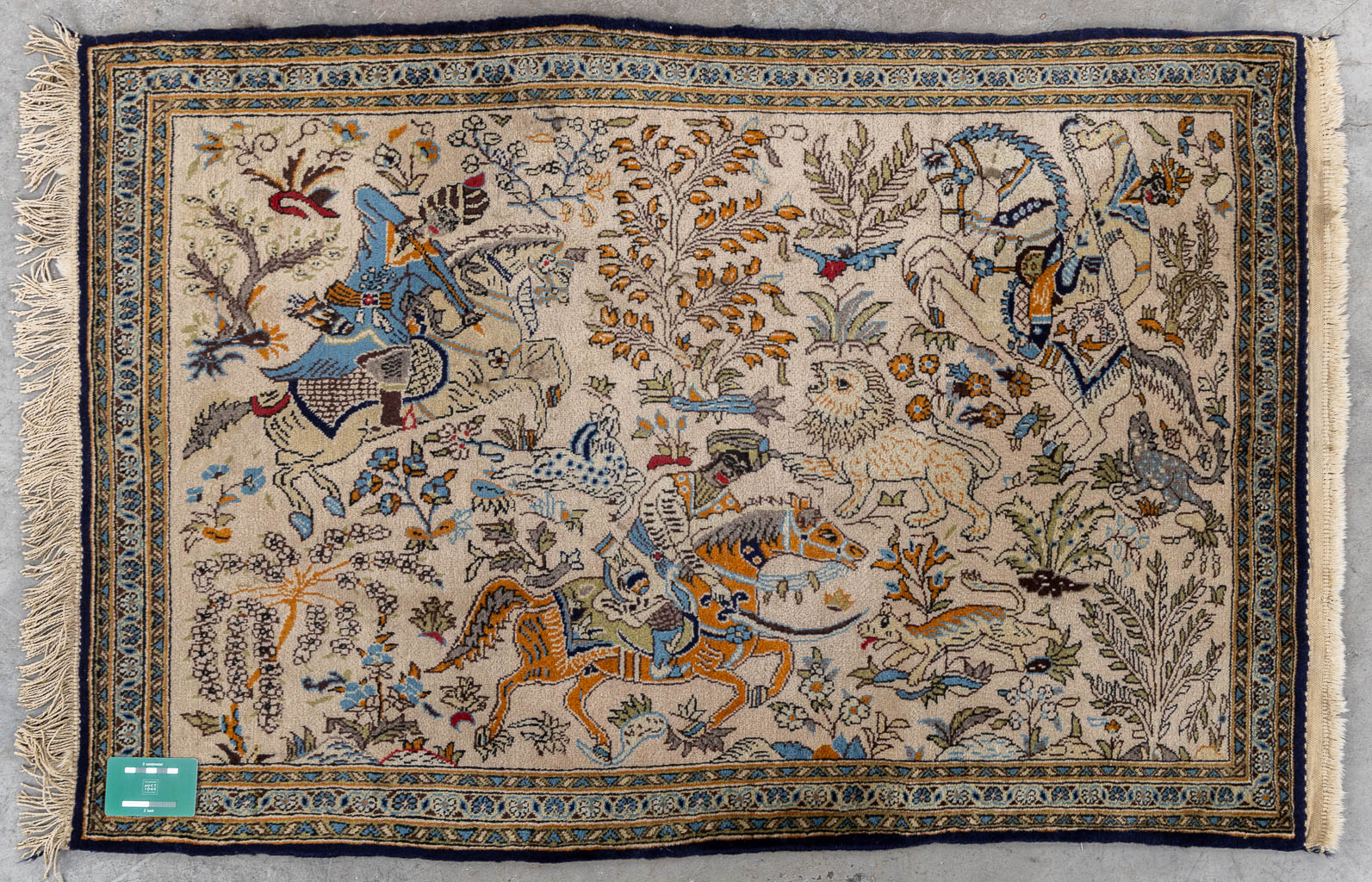 An Iranian hand-made carpet with equestrian hunting decor, Isphahan/Isfahan. (L:82 x W:120 cm)