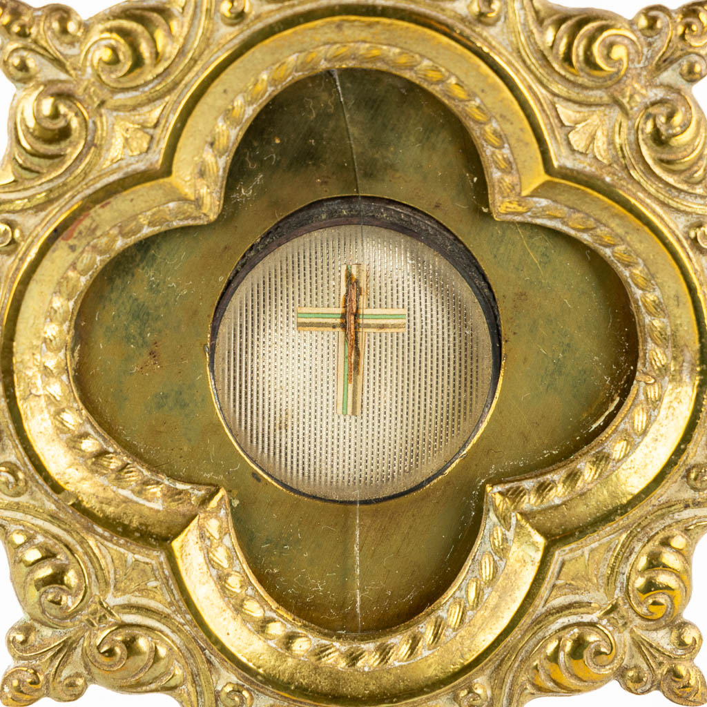 A reliquary monstrance with a relic of The True Cross, 'De Ligno Cruxis, DNJC'. Jesus Christ.