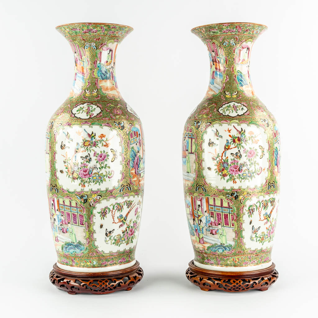 A pair of Chinese Canton vases, decorated with Ladies, fauna & flora, 19th C.