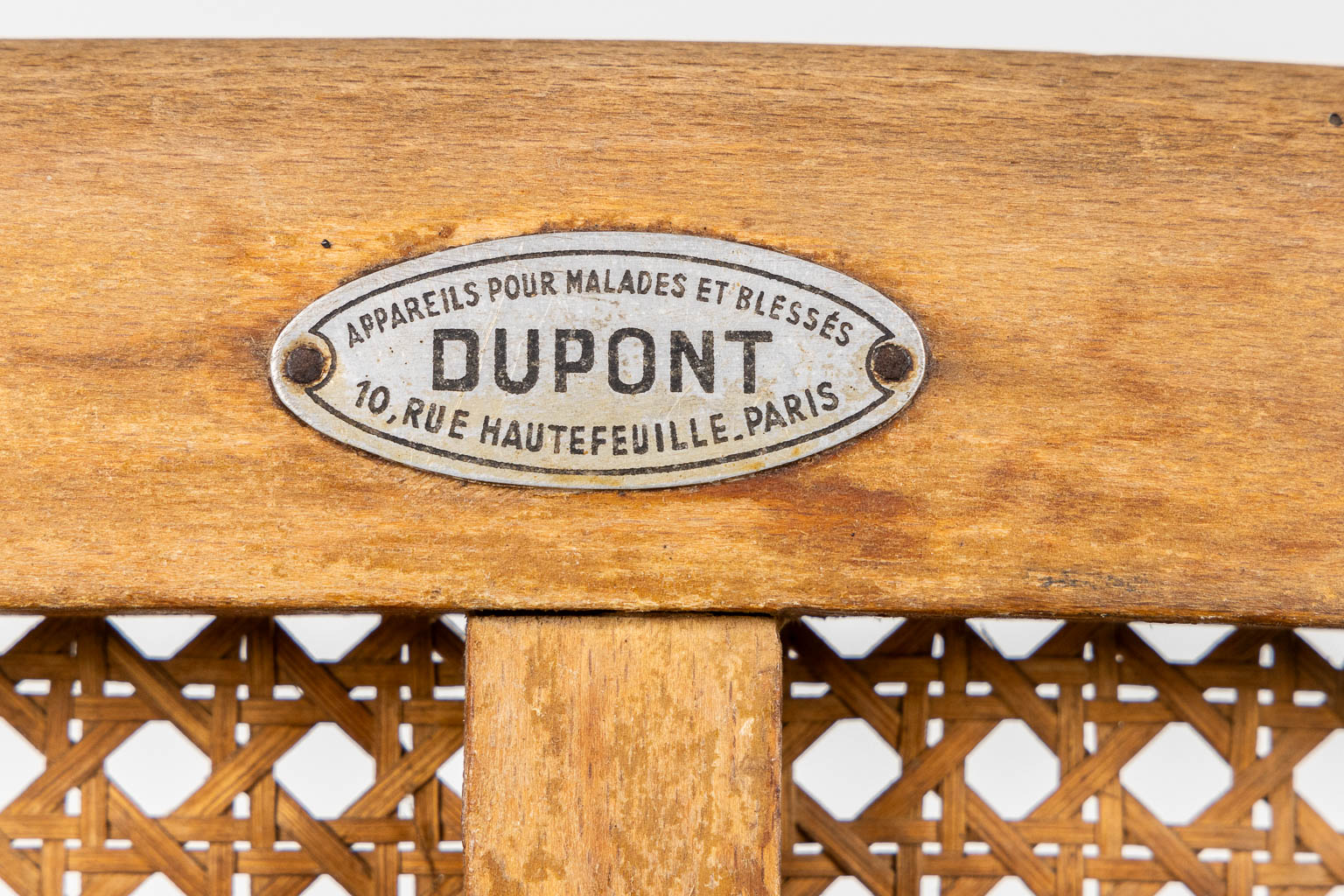 Dupont, Paris, an antique wheelchair. Circa 1900-1920. (L:97 x W:68 x H:105 cm)