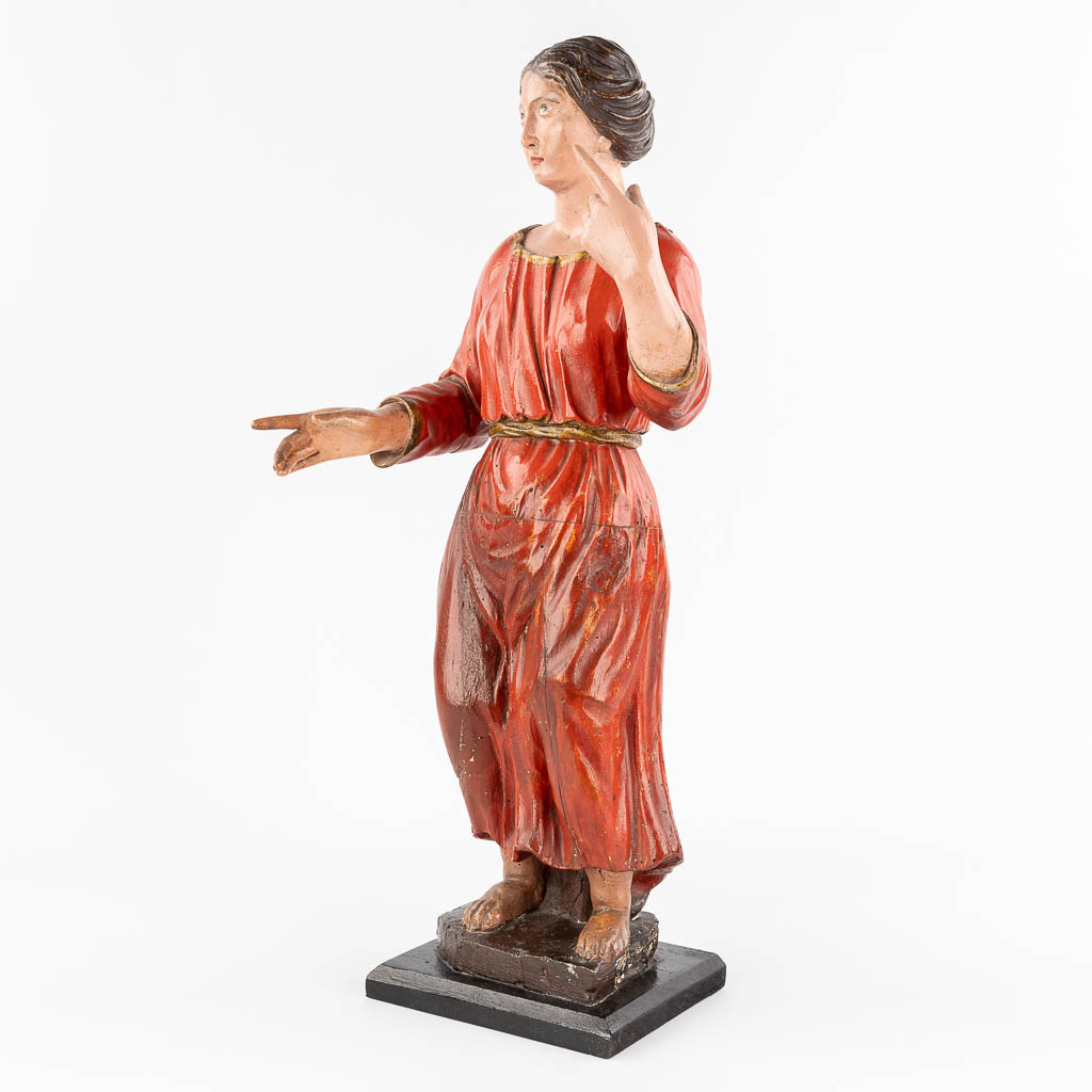 An antique wood-sculptured and polychrome figurine of a noble lady. 18th/19th C. (L: 20 x W: 25 x H: 60 cm)