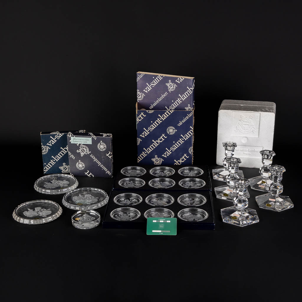 Val Saint Lambert, bottle and glass coasters, 5 candlesticks and a paperweight. (H:12,5 x D:10,7 cm)