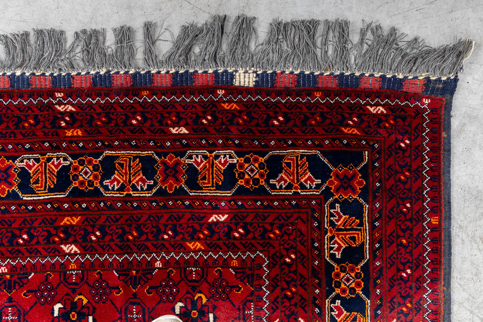 An Oriental hand-made carpet, Afghan. (L:290 x W:193 cm)