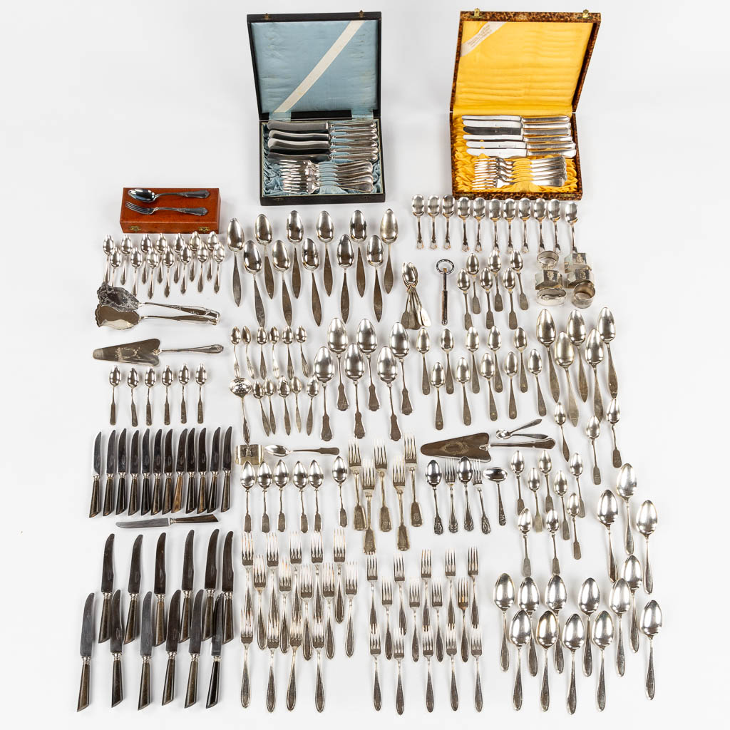 A large collection of silver and silver-plated cutlery. 