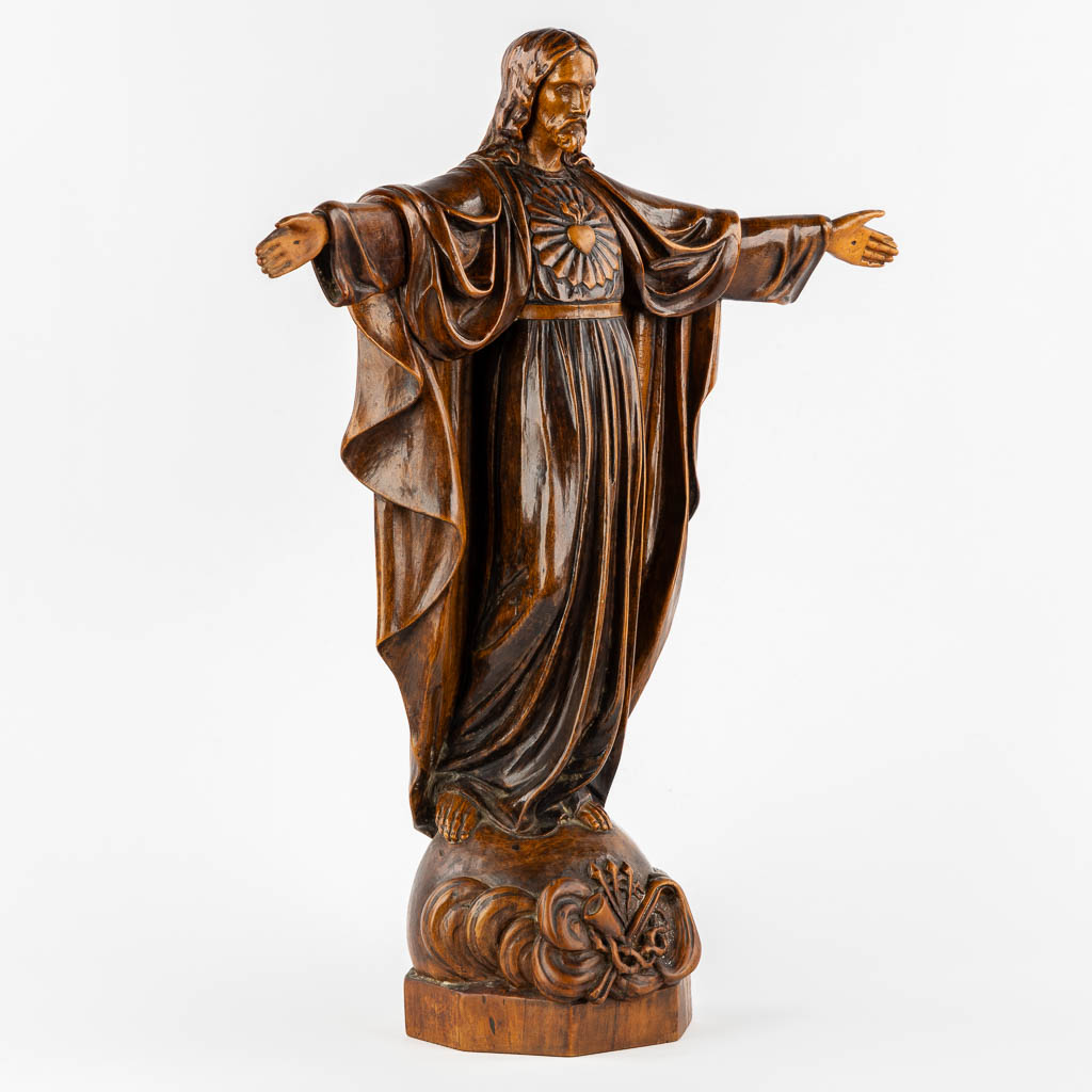 An antique wood sculpture of 'Jesus Christ The Redeemer'.