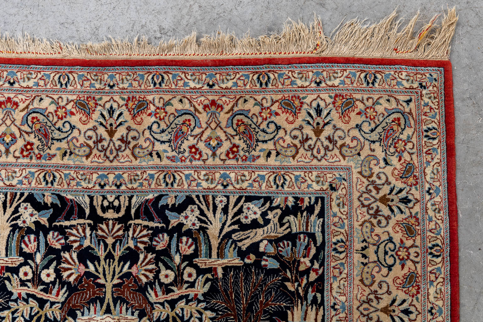 An Oriental hand-made carpet, birds and trees, Isphahan/Isfahan. (L:181 x W:107 cm)