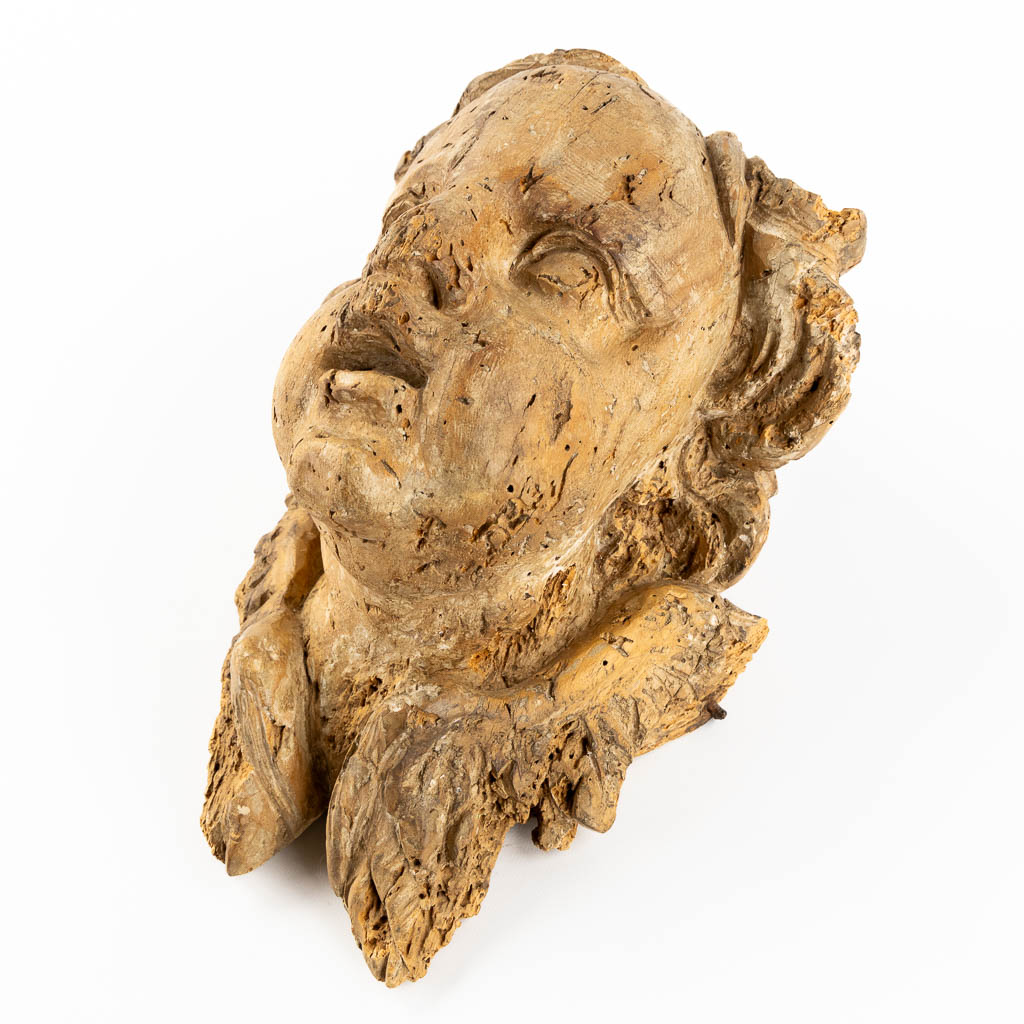 Head of an angel, an antique wood sculpture. 18th C. (L:18 x W:20 x H:30 cm)