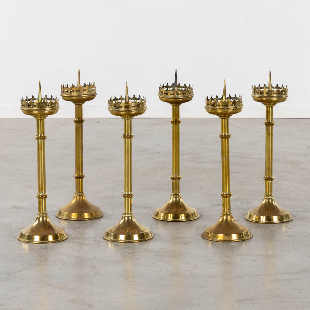 A set of 6 brass church candelsticks, Gothic Revival. (H:55 cm)