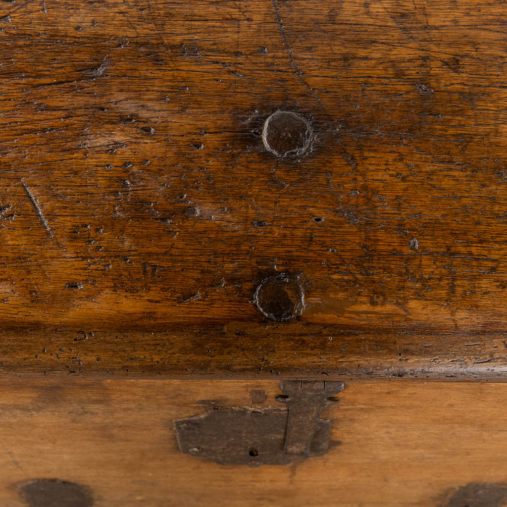 An antique chest with wrought iron hardware, circa 1700. (L:52 x W:93 x H:48 cm)