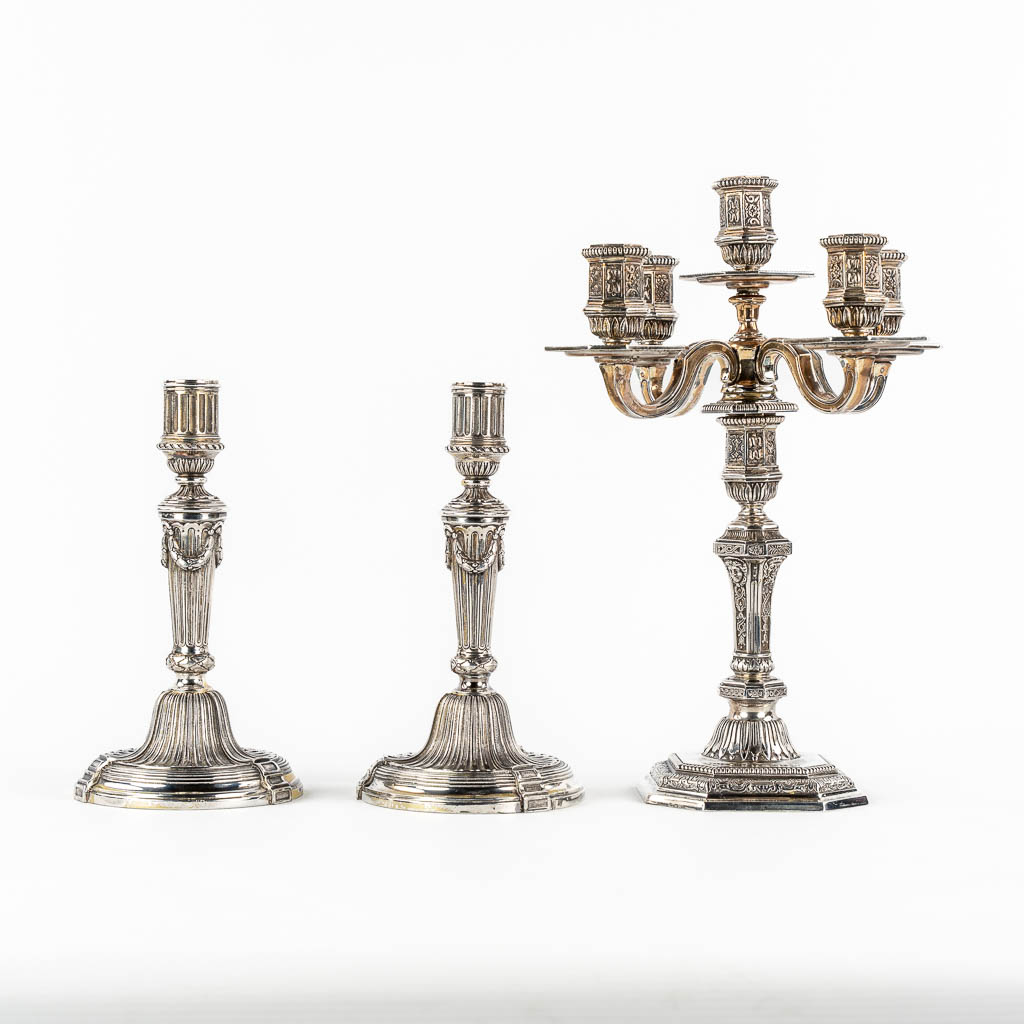 Christofle 'Duperier' a large candelabra, added are a pair of Candlesticks in Louis XVI style.